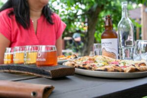Cambium Cidery artisan pizza and flight of cider 