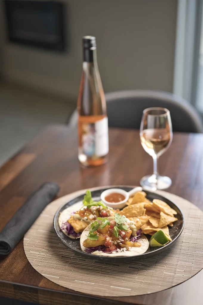 plate of food and glass of wine